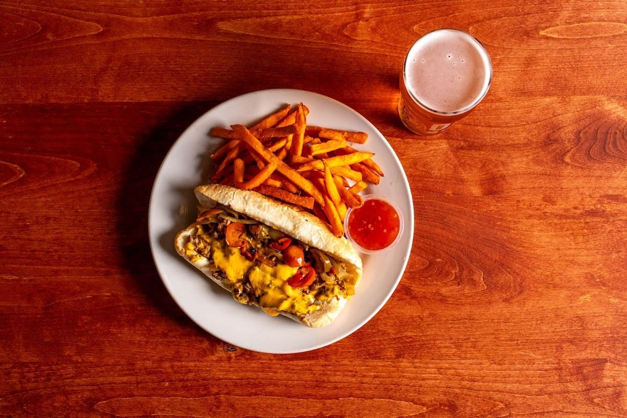 Philly Cheesesteak Sandwich and Fries